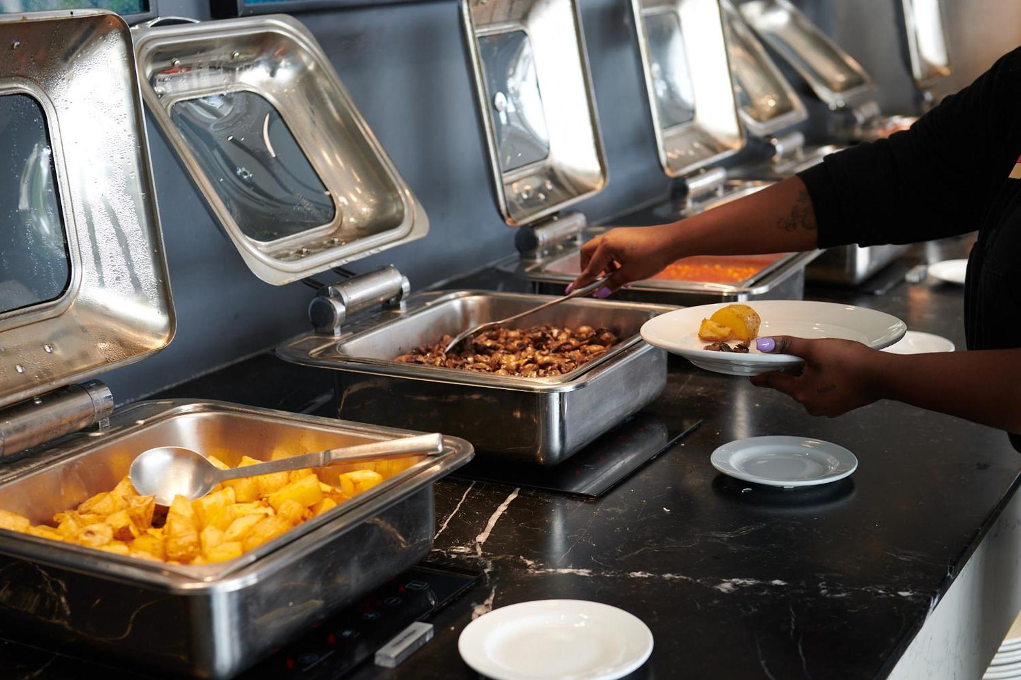 Seven Villa Hotel & Spa Johannesburg Exteriör bild A chafing dish